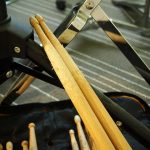 Why Do Some Drummers Wear Gloves? Music FAQs